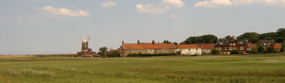 Cley Mill and village from across the marsh